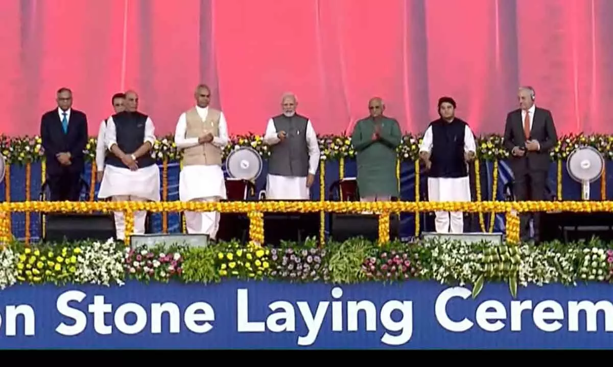 Prime Minister Narendra Modi lays the foundation stone of C-295 transport aircraft manufacturing plant in Vadodara, Gujarat, on Sunday. Union Defence Minister Rajnath Singh, Union Minister for Civil Aviation Jyotiraditya M. Scindia, Gujarat Governor Acharya Devvrat and Chief Minister Bhupendra Patel are also seen