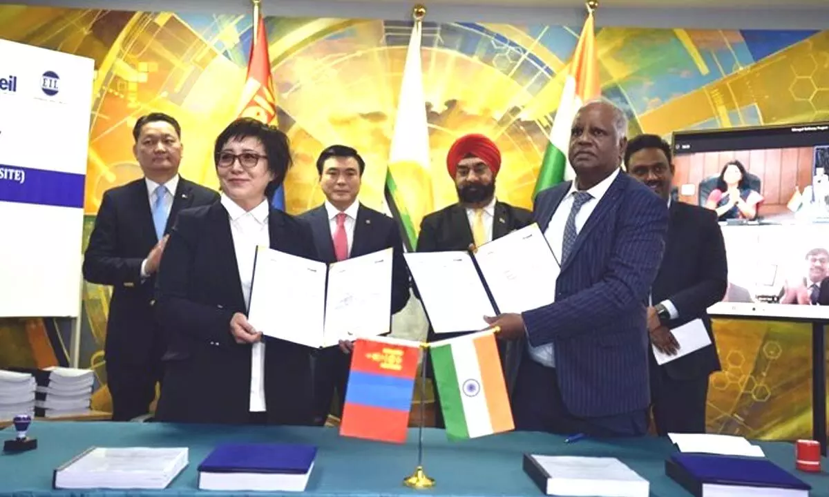 Mongol Refinery Executive Director Dr Altantsetseg and Hydrocarbons Director P Doraiah MEIL after signing the agreement