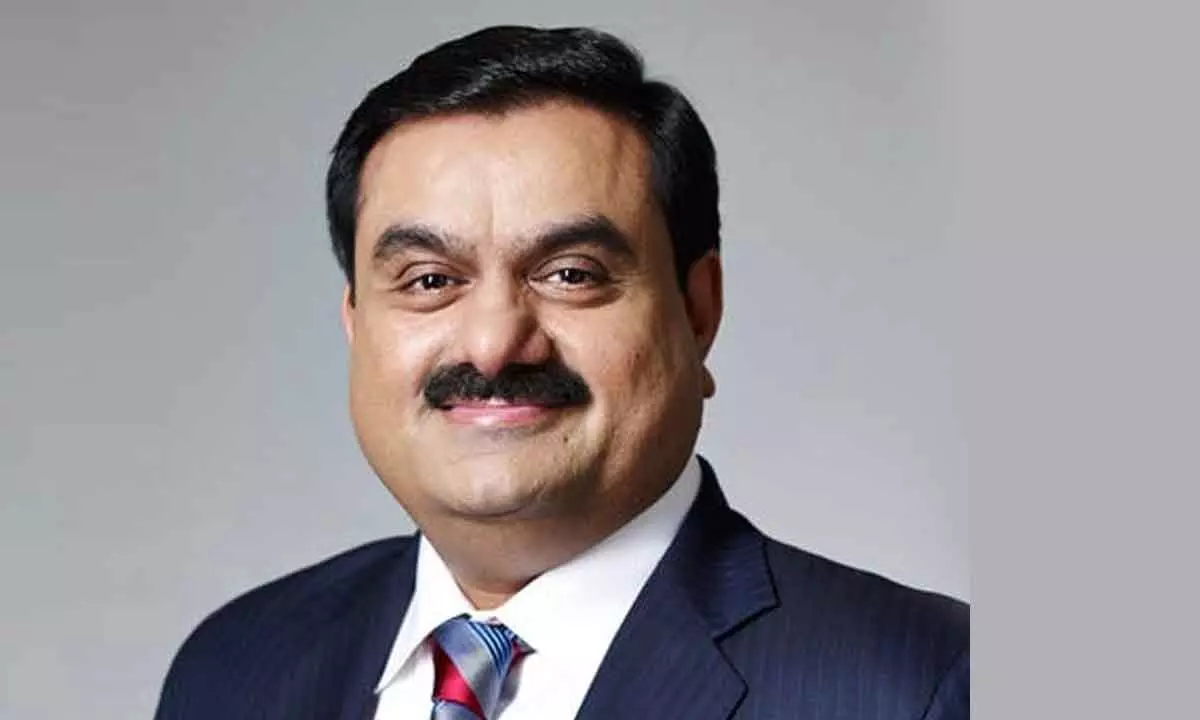 Adani regrets not completing college edu