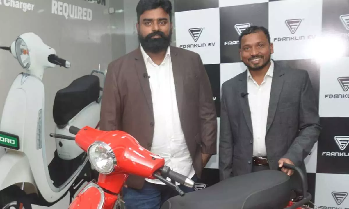 (L-R) Franklin EV co-founders Naveen Kumar and Ranjith Kumar with Koro electric scooter