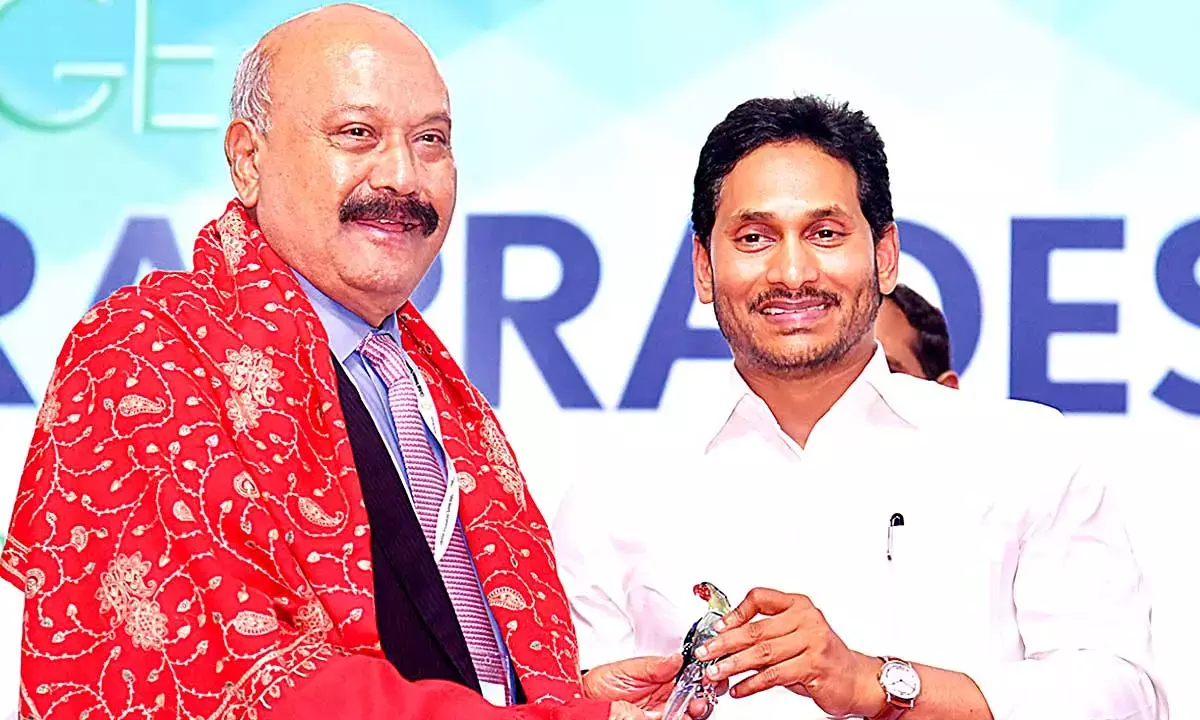 AP CM Jagan Mohan Reddy felicitating  G M Rao, Chairman, GMR Group