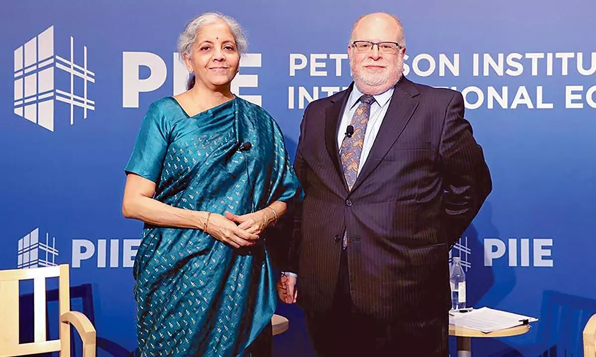 Union Finance Minister Nirmala Sitharaman with PIIE President Adam Posen at the Peterson Institute for International Economics, in Washington on Tuesday