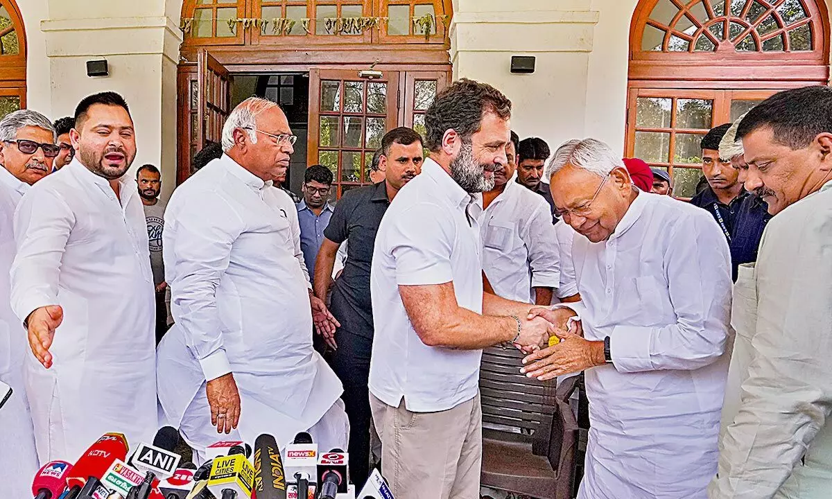 Congress leader Rahul Gandhi with Bihar Chief Minister Nitish Kumar at Congress president Mallikarjun Kharges residence in New Delhi on Wednesday