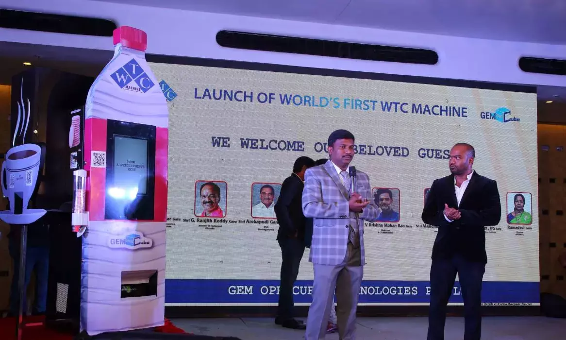 Mr. P. Vinod Kumar, inventor of the Worlds First WTC(Water, Tea, Coffee and Biscuits) dispenser machine and CEO of Gem Opencube Technologies and Mr. Venkat Yadav, MD Gem Opencube at WTC Machine
