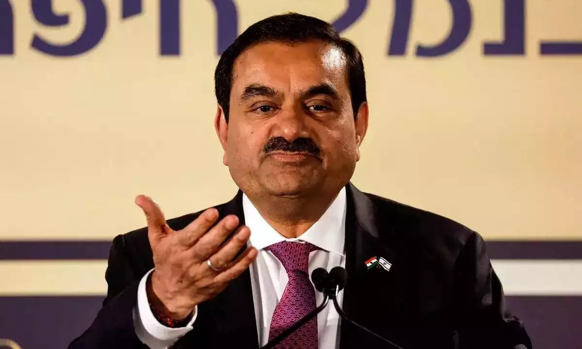 \Adani raises $9 bn via stake sale in 4 yrs