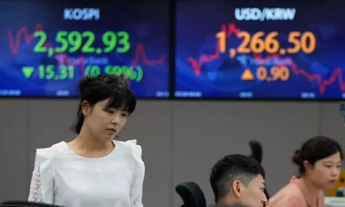 Asian shares mixed on Japan’s weaker trade data