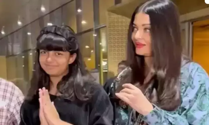 Aaradhya Bachchans Sweet Namaste to Paparazzi on Mumbai Return with Abhishek and Aishwarya Rai!