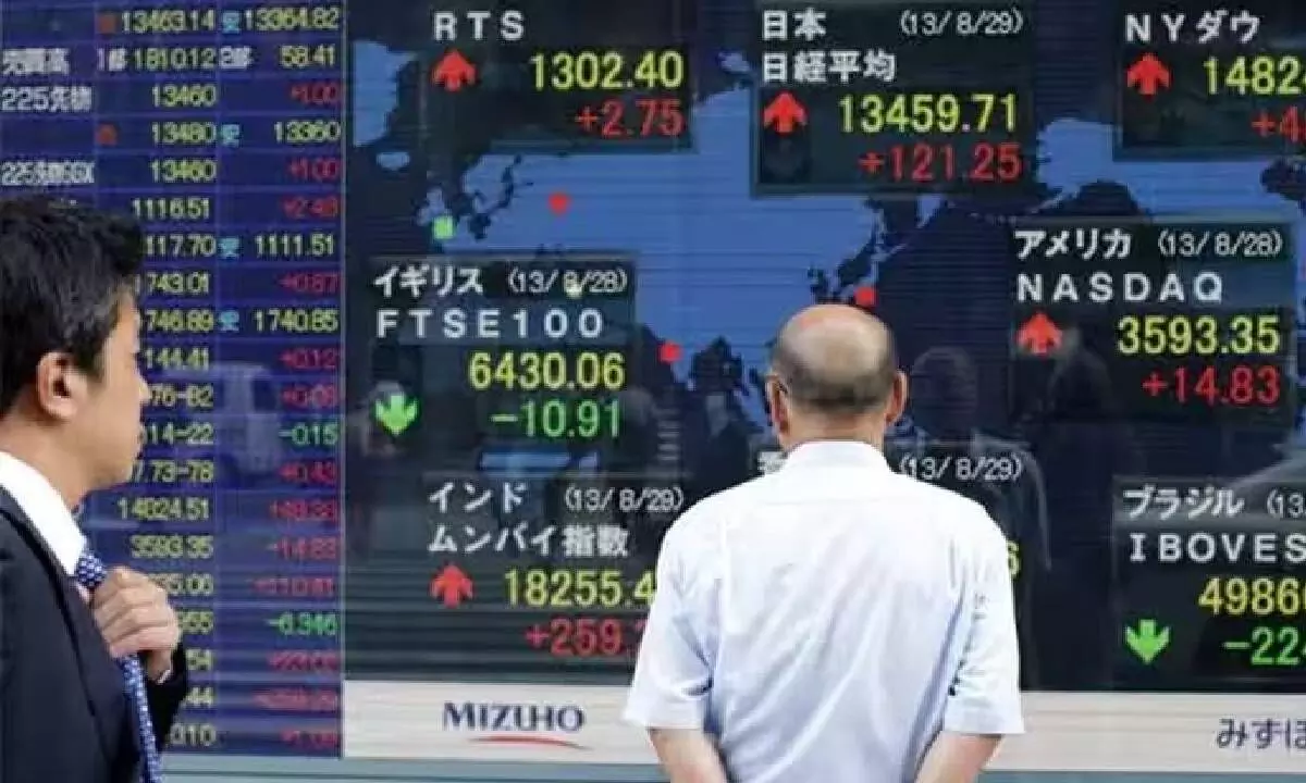 Asian shares mixed after BoJ rejigs bond policy