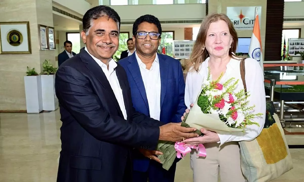 C Srini Raju (left), Chairman, and Dr Ravindra Sannareddy, Founder Managing Director, Sri City, welcoming Ms Jennifer Larson, Consul General (Andhra Pradesh, Telangana & Odisha), United States of America