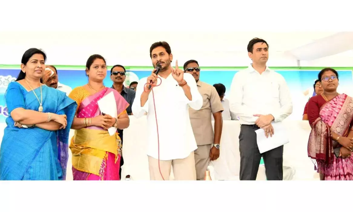 Chief Minister YS Jagan Mohan Reddy speaking to people in rain-affected areas on Monday