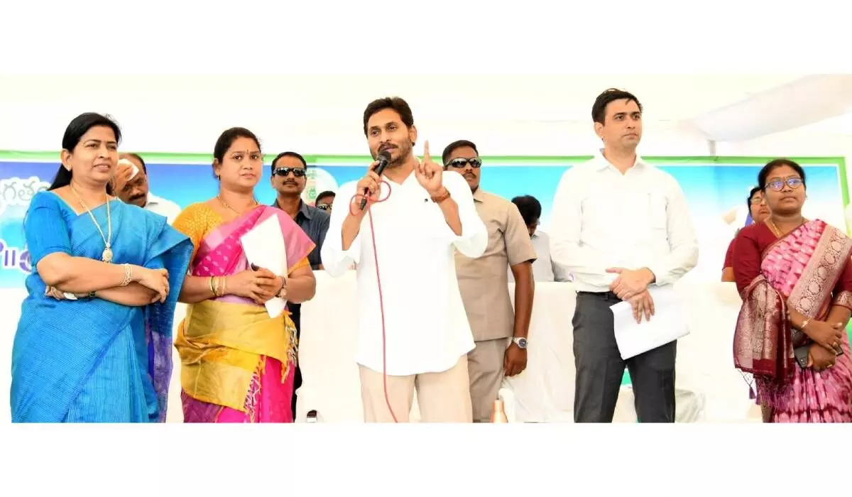Chief Minister YS Jagan Mohan Reddy speaking to people in rain-affected areas on Monday