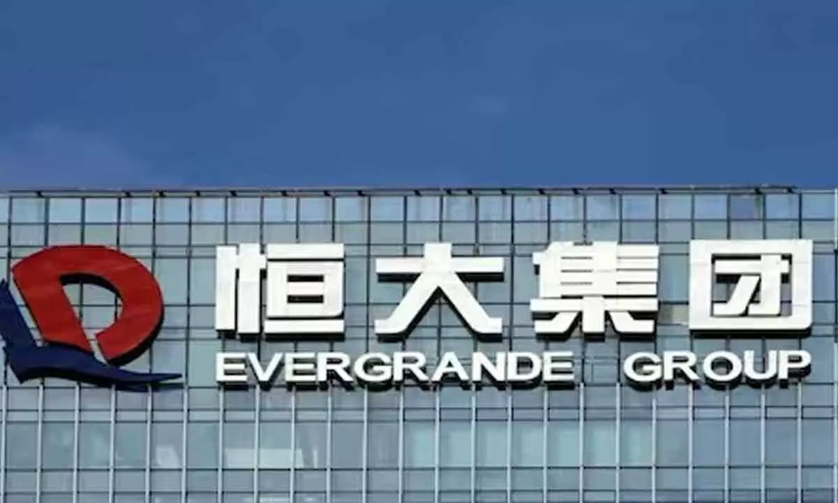 Hong Kong bourse suspends trading in China Evergrande