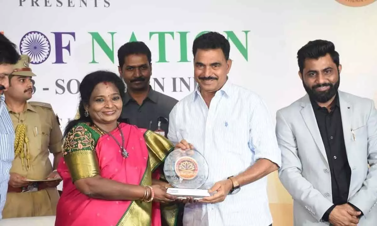 Dr Tamilisai Soundararajan, Governor of Telangana presenting the award to Indian actor Sayaji Shinde at an event held recently