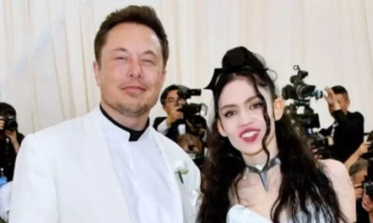 Grimes sues Musk for not letting her see one of their 3 children Grimes sues Musk for not letting her see one of their 3 children