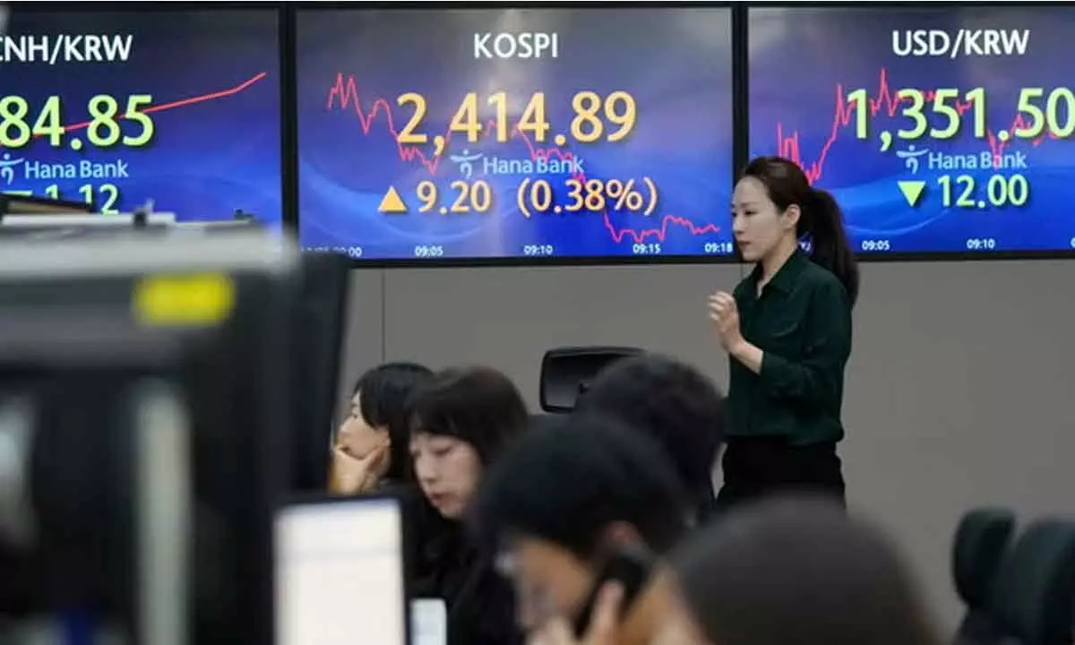 Asian shares rise on Wall St rally