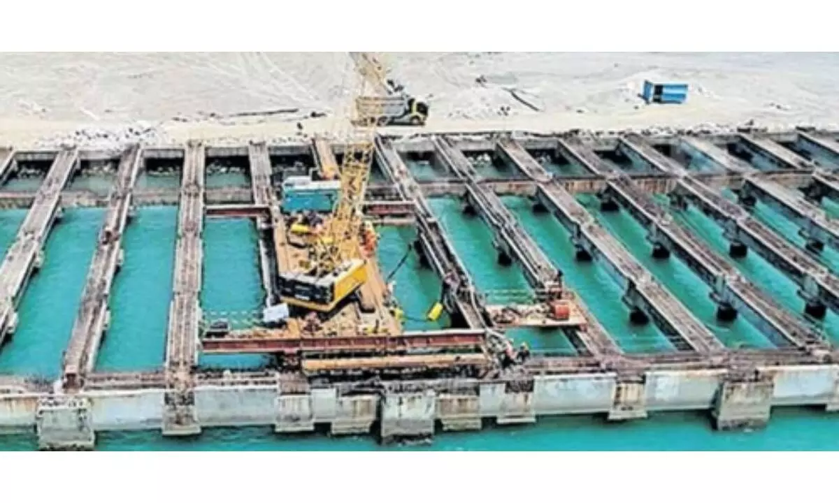 Water salute to first ‘ship’ carrying massive cranes at Keralas Vizhinjam International Port