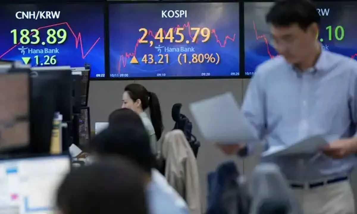 Asian stocks shares rise tracking Wall St