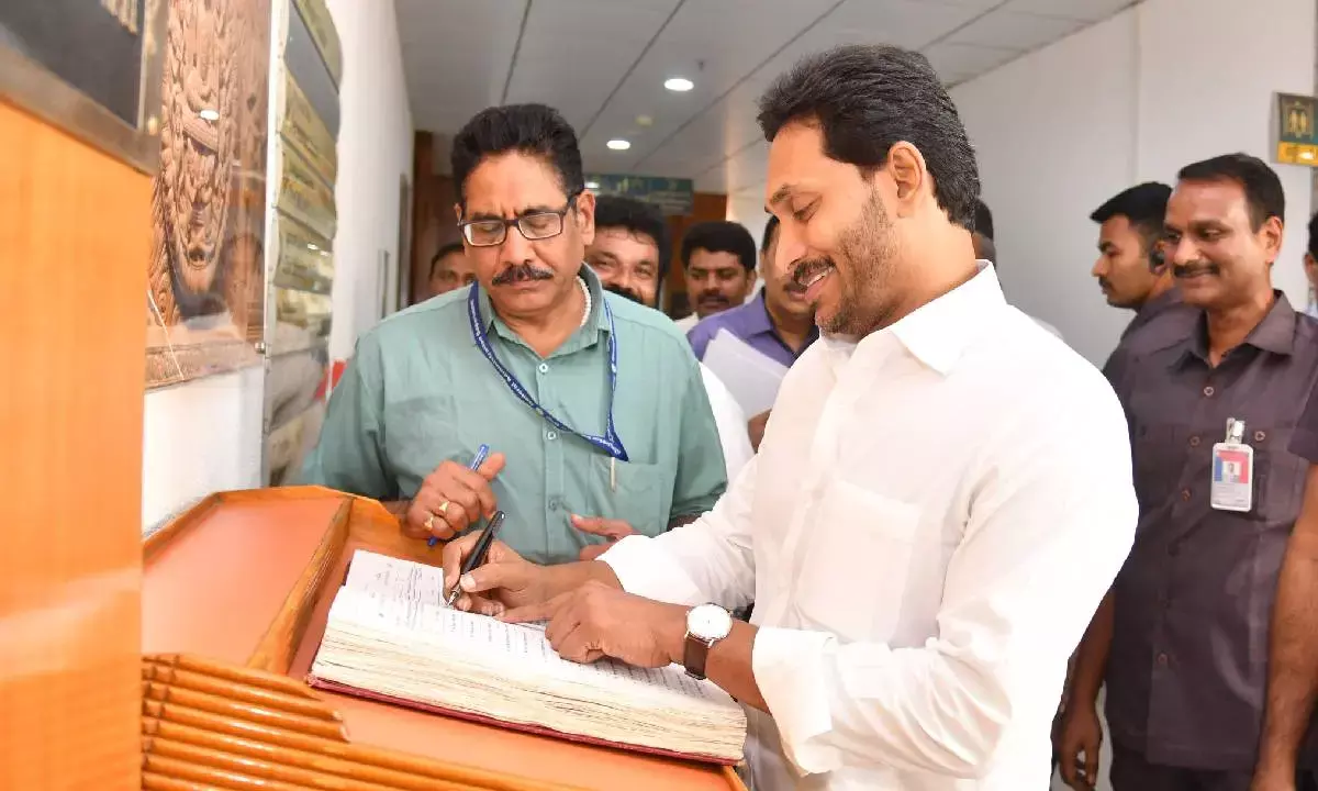 AP Chief Minister Y.S. Jagan Mohan Reddy signing in the attendance register participating in the Cabinet meeting at Velagapudi on Friday