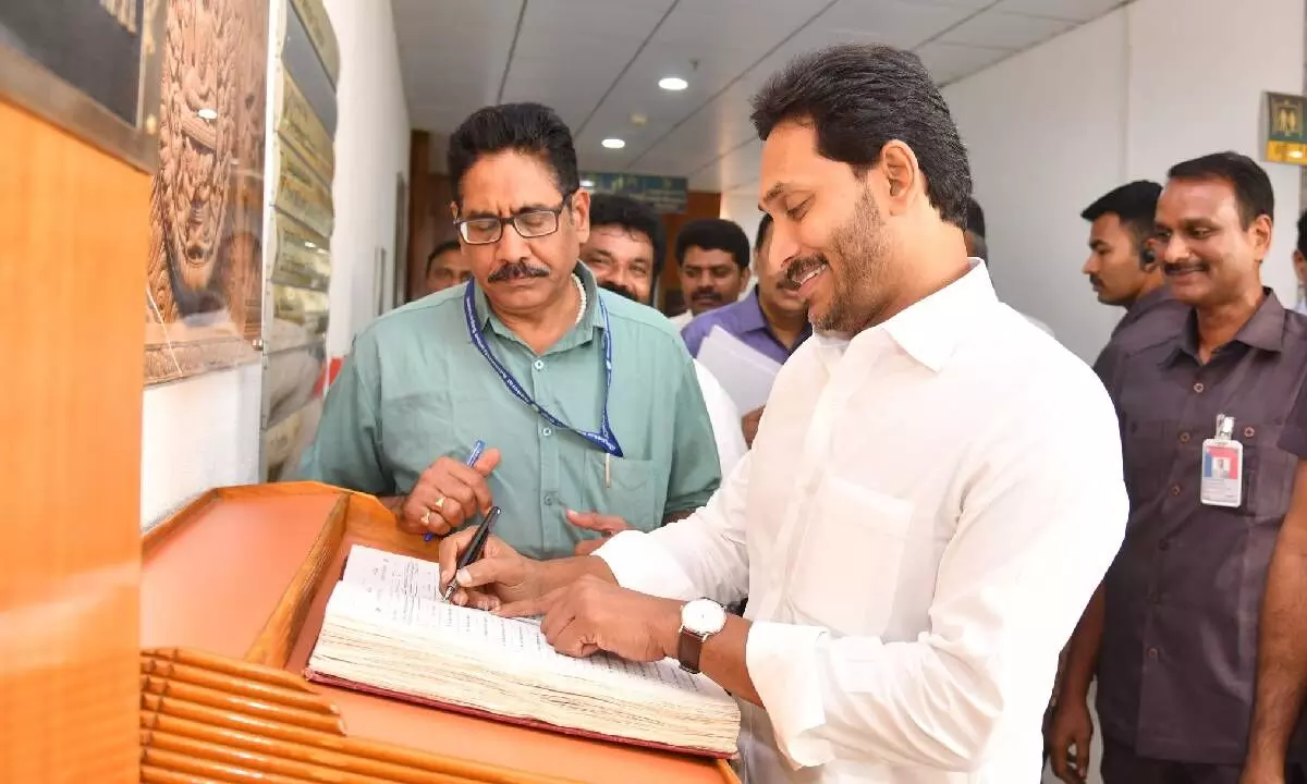 AP Chief Minister Y.S. Jagan Mohan Reddy signing in the attendance register participating in the Cabinet meeting at Velagapudi on Friday