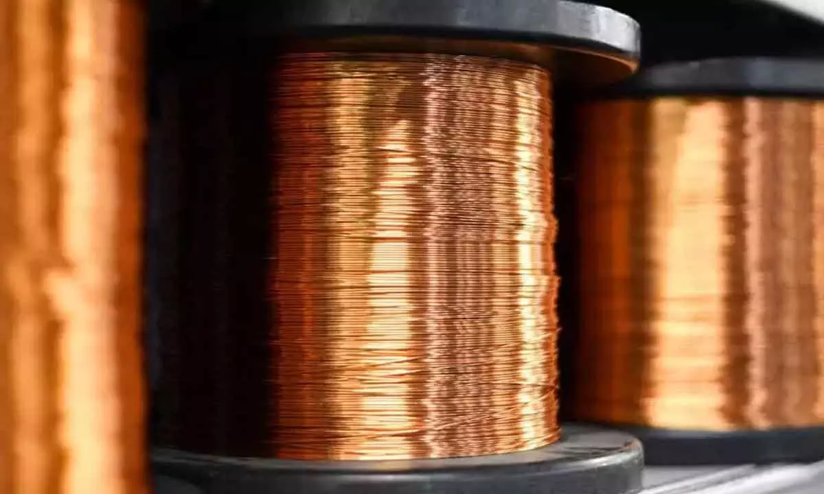 Copper futures slip on muted spot demand