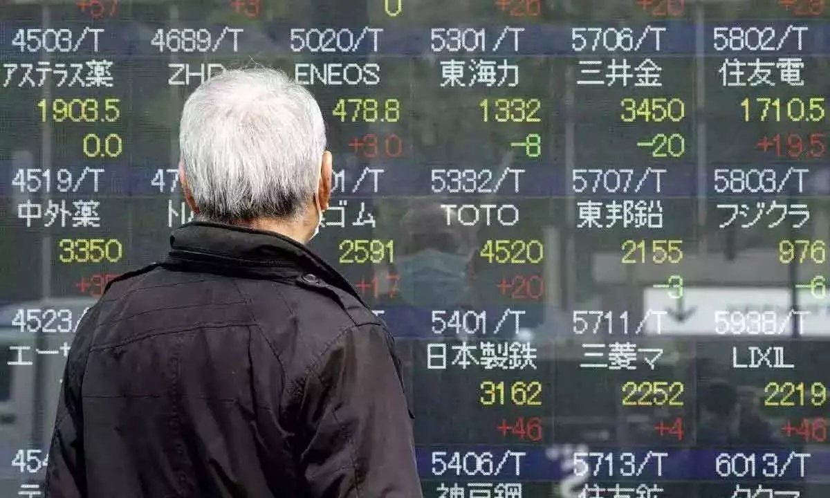 Asian stocks recalibrating on mixed results in US mkts