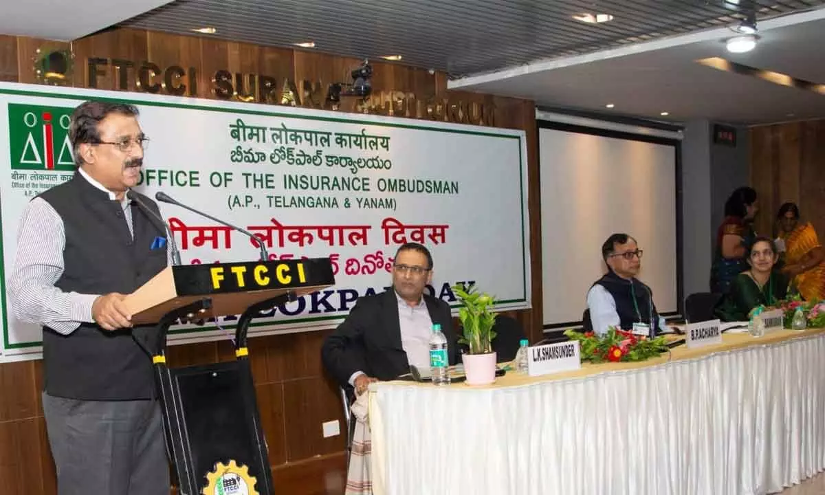 B P Acharya, former Special Chief Secretary, Government of Telangana addressing the gathering during Bima Lokpal Day, in Hyderabad on Wednesday