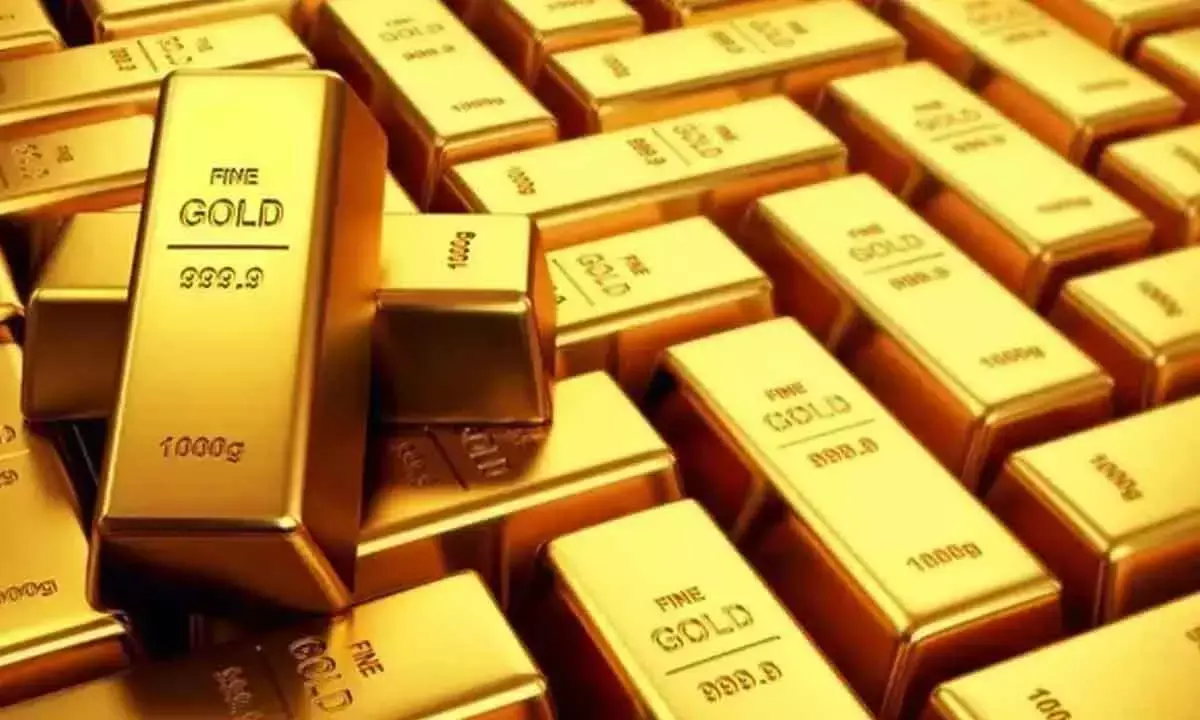 Bullion prices fall on global cues