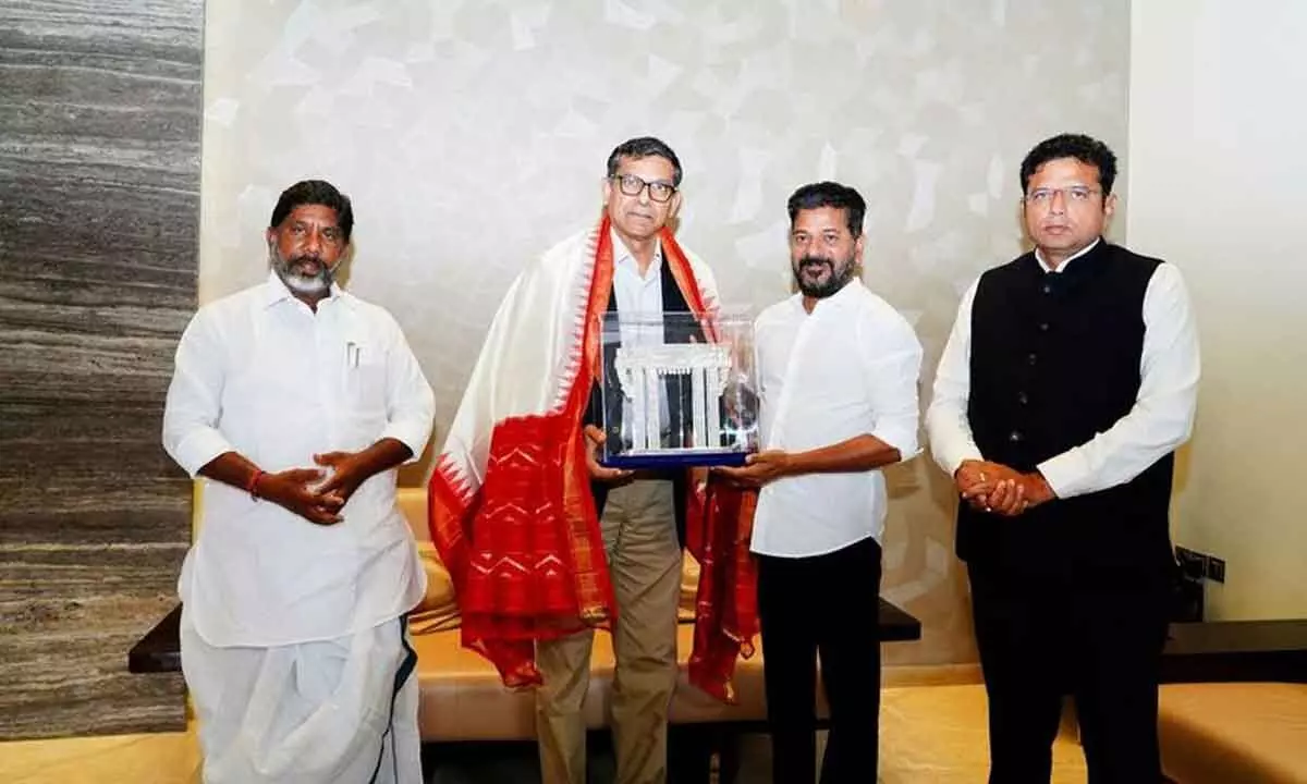 Former RBI governor Raghuram Rajan with Telangana CM Revanth Reddy