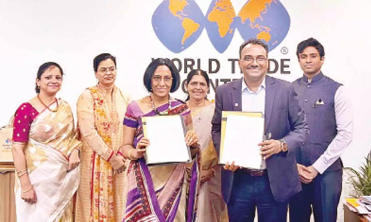 Dr Uma Rani, CEO, SCIINV Biosciences and Y Varaprasad Reddy, Chairman, World Trade Center, Shamshabad, with the  MoU in Hyderabad on Monday