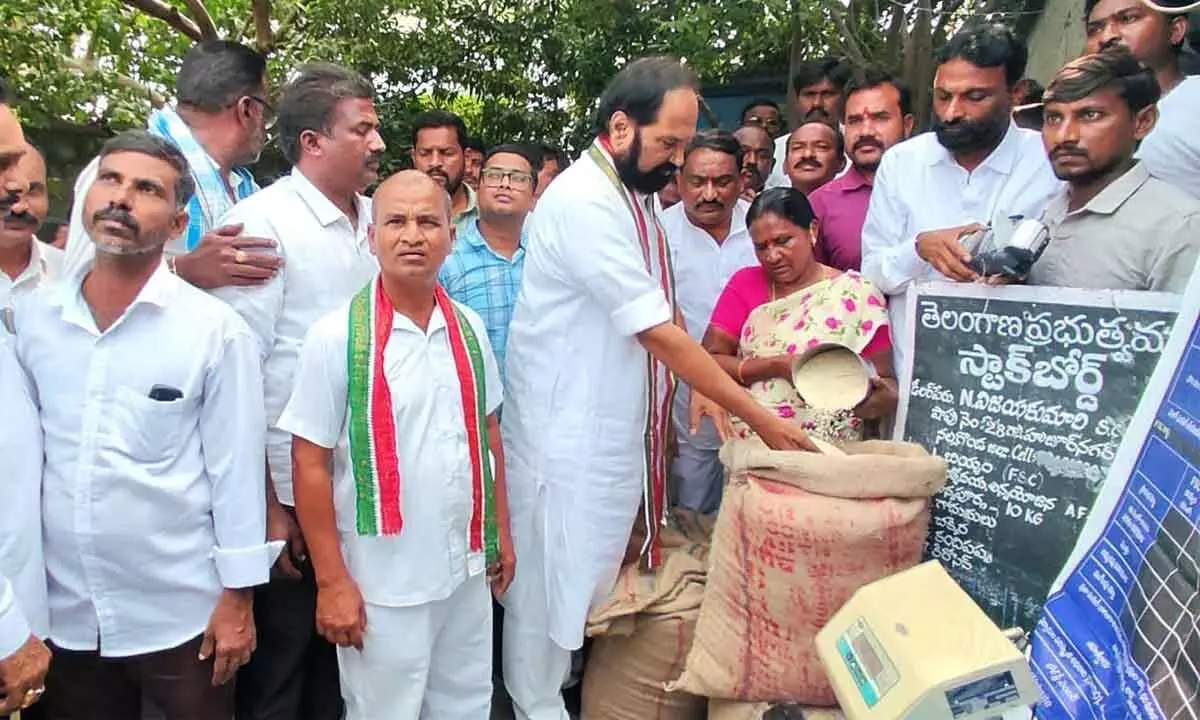 Telangana Irrigation, Food, and Civil Supplies Minister N Uttam Kumar Reddy inspecting a ration shop in  Huzurnagar on Monday