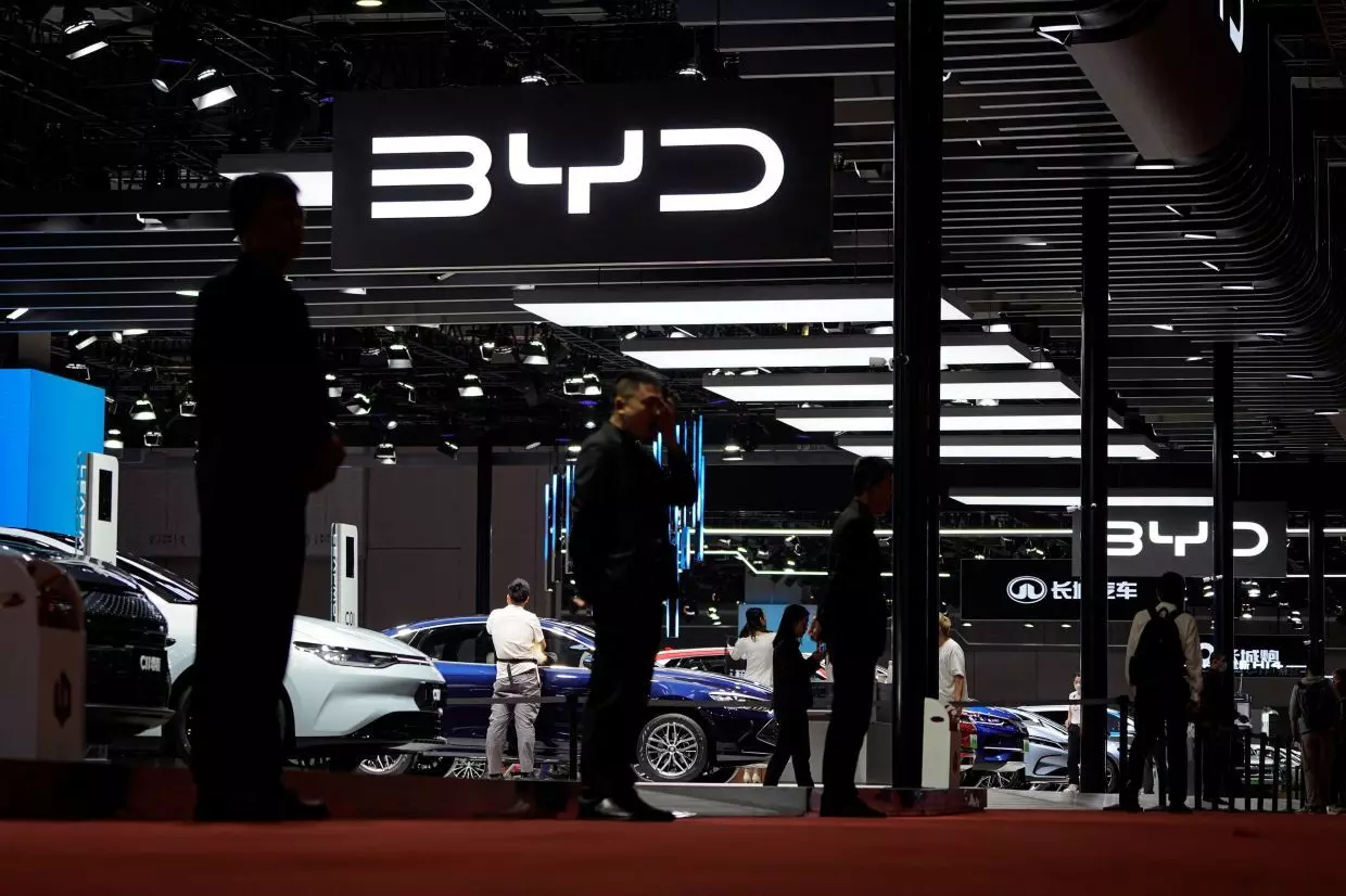 BYD rises to challenge Tesla in EV market with record sales