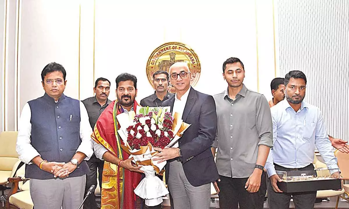 Jayadev Galla, CMD, Amara Raja Energy and Mobility with Telangana Chief Minister A Revanth Reddy and IT & Industries Minister D Sridhar Babu during their meet in Hyderabad on Wednesday