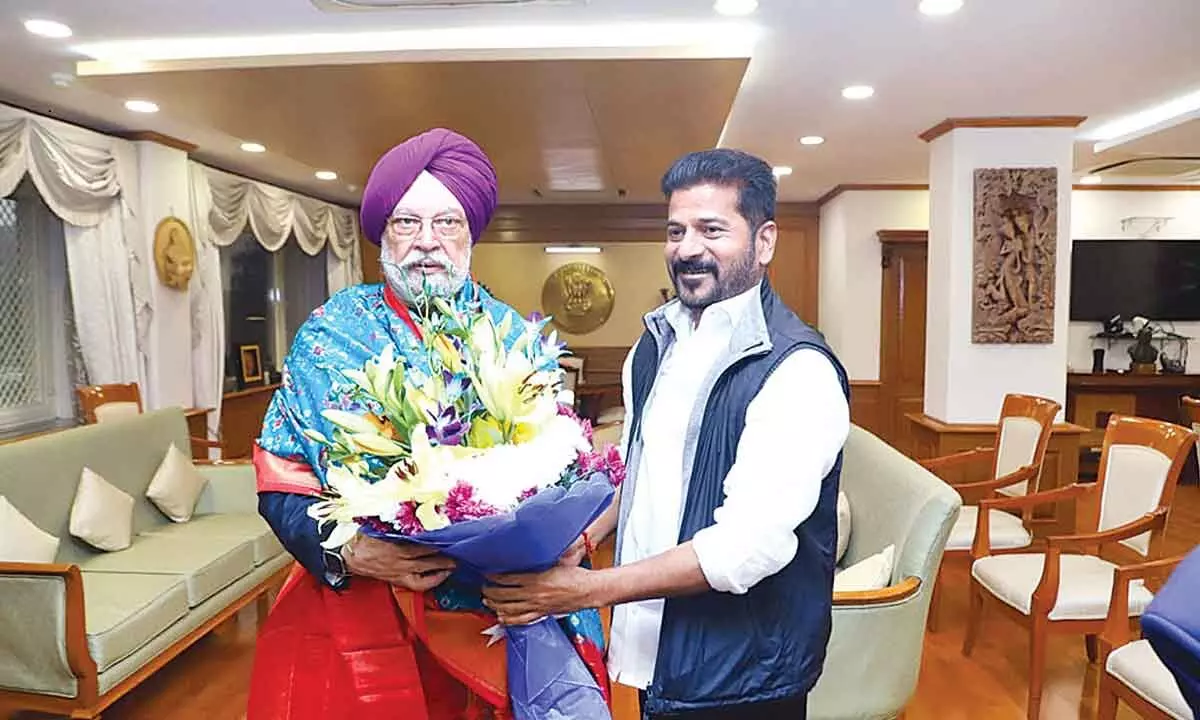 CM Revanth calls on Union Housing Minister Puri