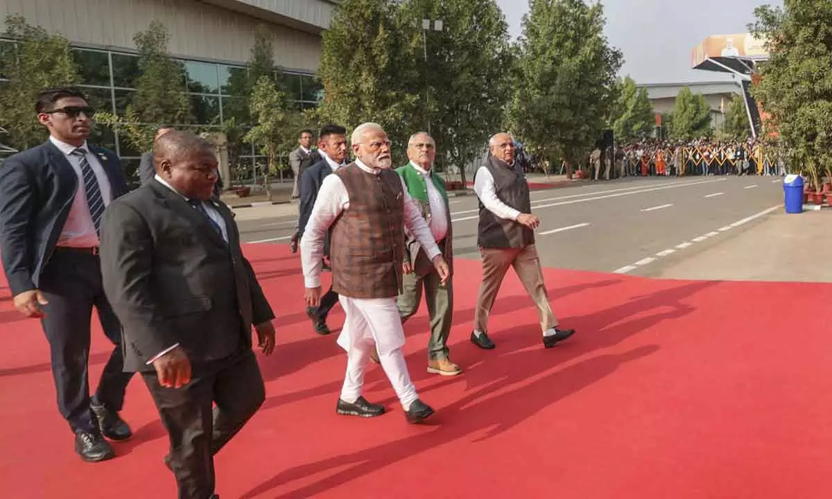 PM arrives in Ahmedabad for 10th Vibrant Gujarat Summit