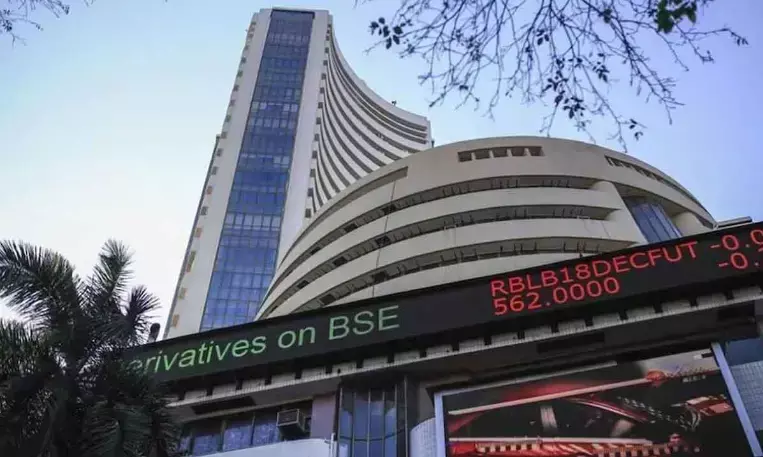 Sensex trades flat after opening at all-time high