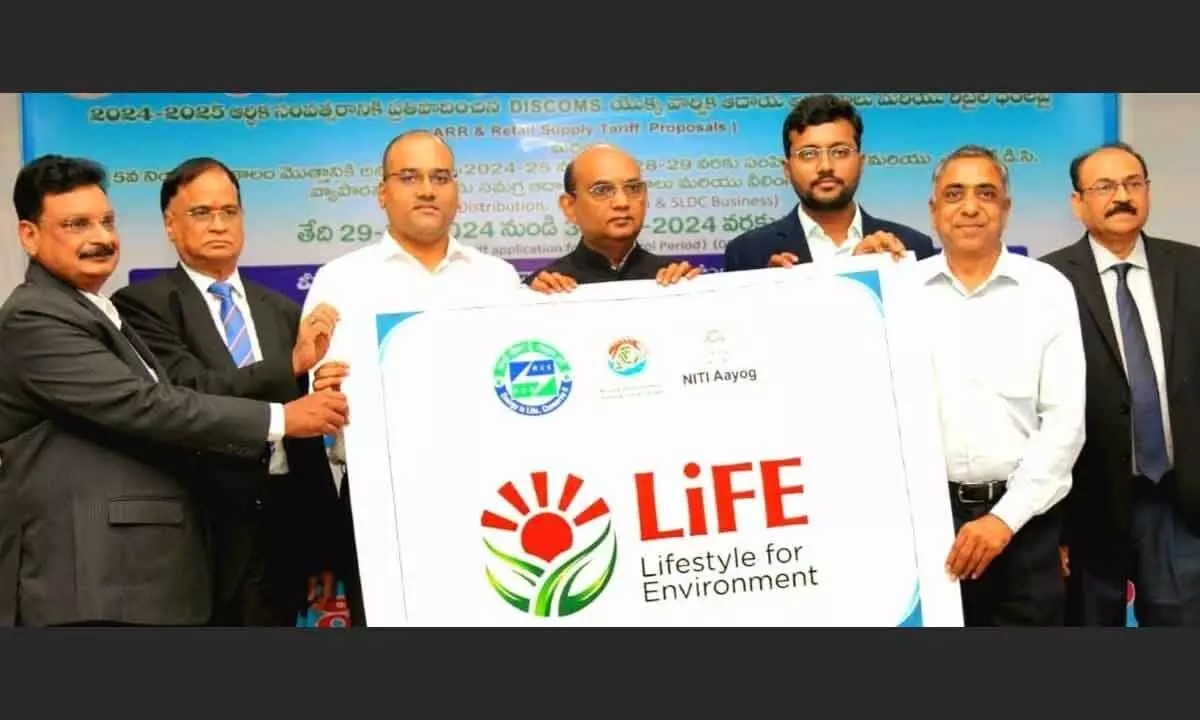 APERC Chairman Justice C V Nagarjuna Reddy releasing poster on LiFE Mission in Visakhapatnam on Wednesday