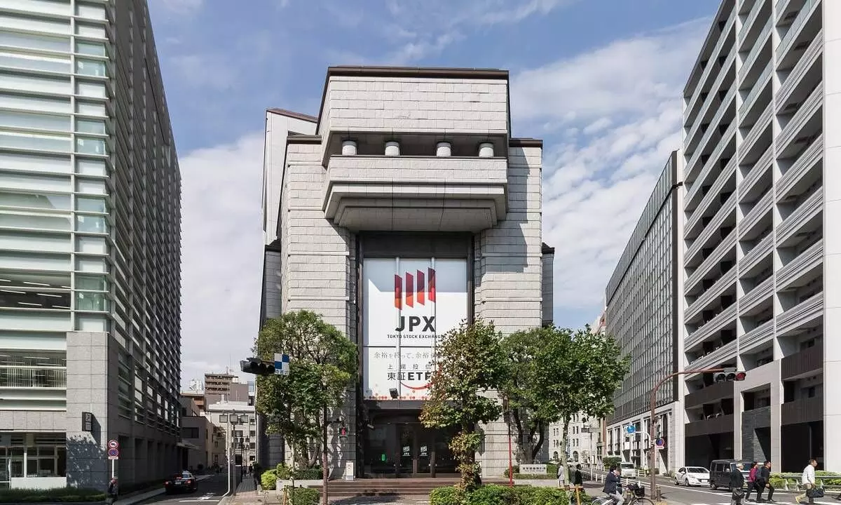 Japans stock index surpasses record high set 34 years ago