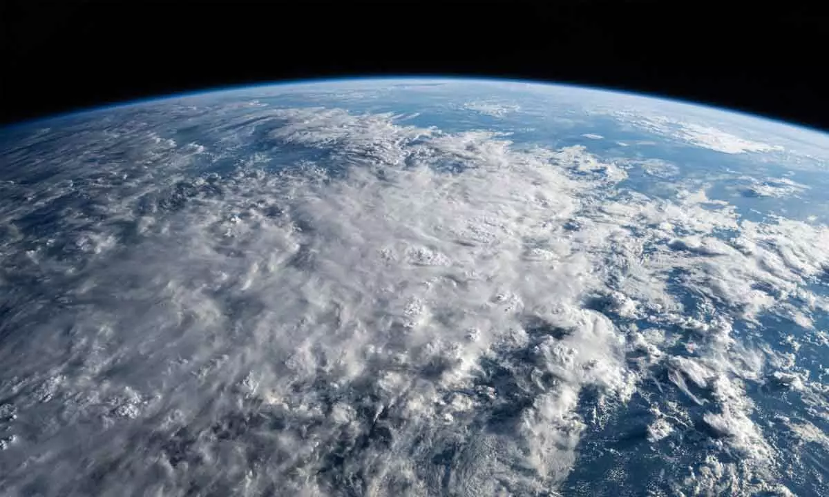 Could we cool Earth by drying upper atmosphere?