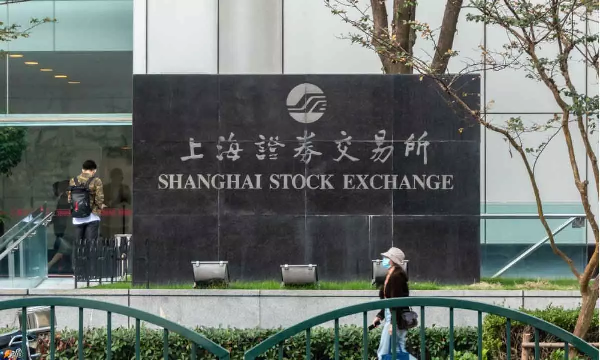 China stocks trade higher on upbeat economic data
