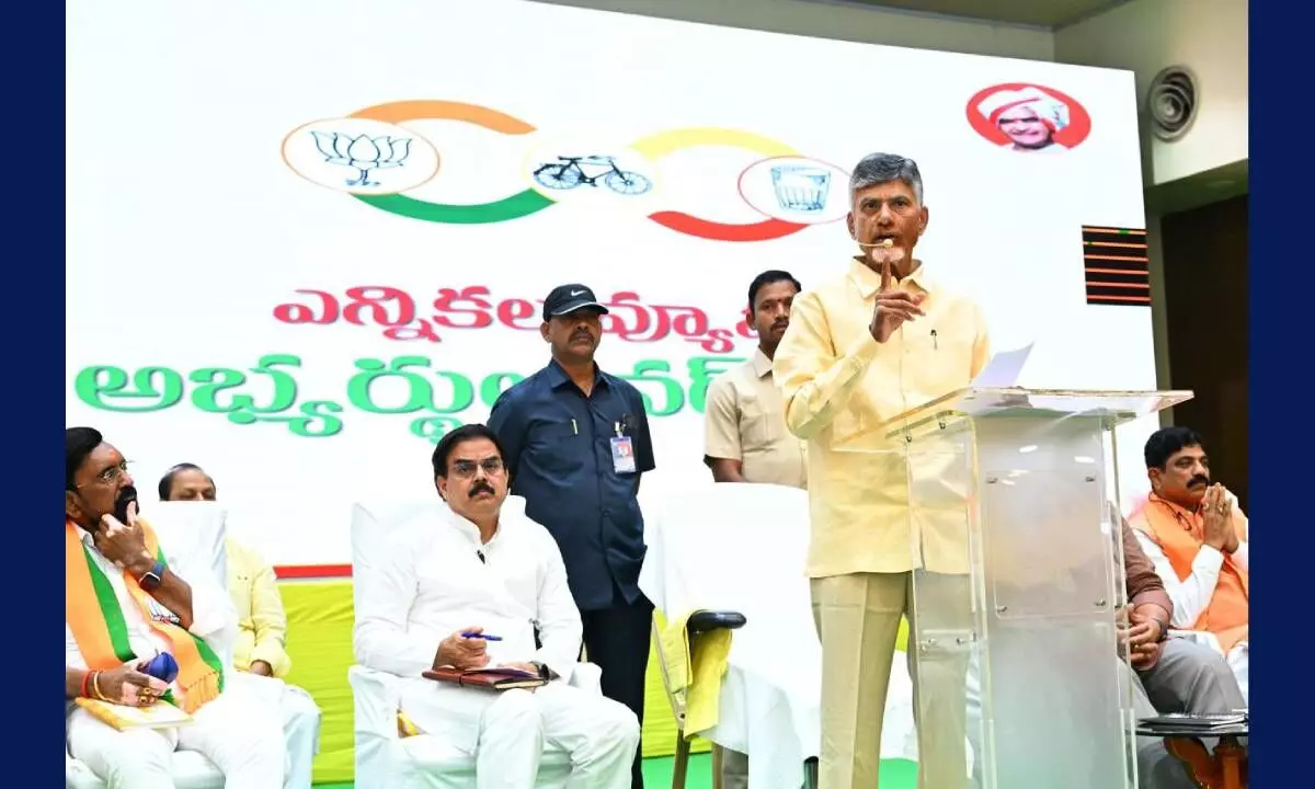 TDP national president N. Chandrababu Naidu speaking at a meeting of three-party alliance in Vijayawada on Saturday