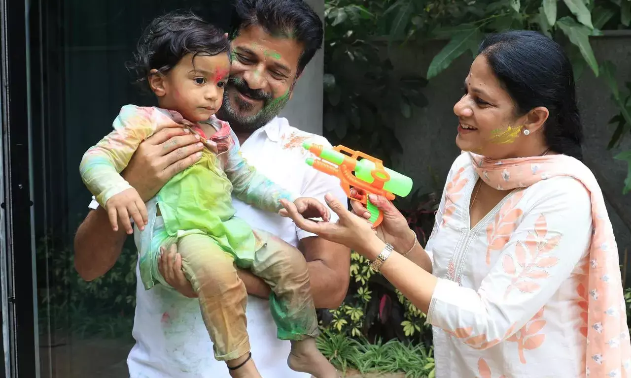 Telangana CM celebrates Holi with grandson