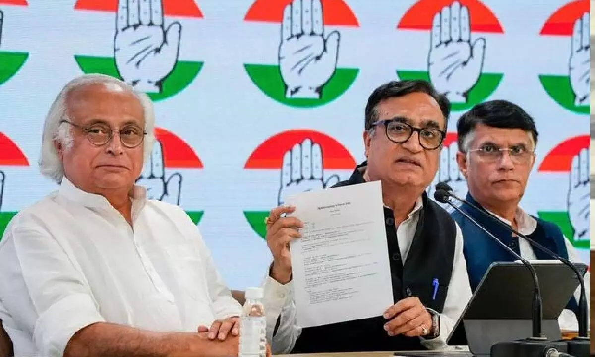 Congress leaders Jairam Ramesh, Ajay Maken and Pawan Khera during a press conference in New Delhi on Friday