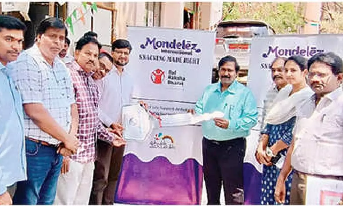 Amit Jain, Plant Director, Mondelez, formally handing-over the key of the ambulance to District Medical and Health Officer Dr Srihari on Friday