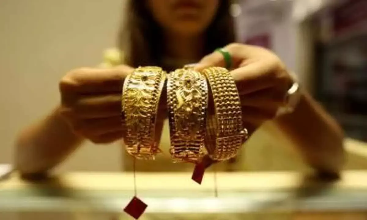 Gold price hits record high of Rs 69,640/10 gm