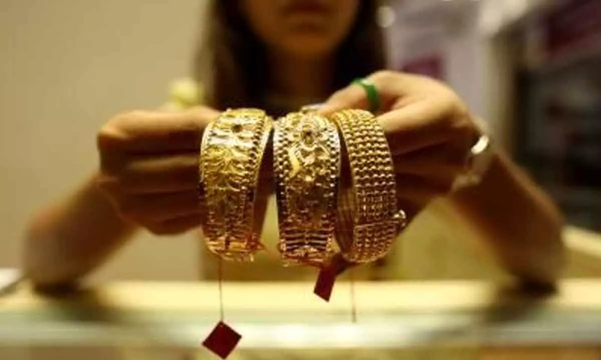 Gold price hits record high of Rs 69,640/10 gm