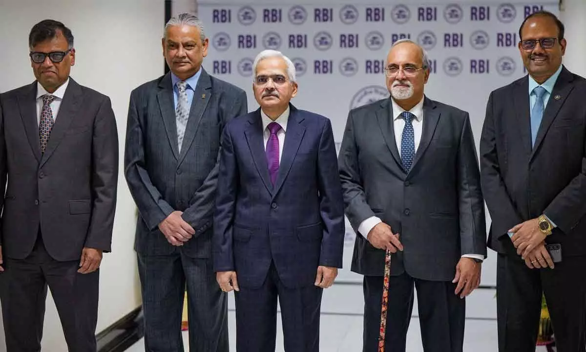 RBI Governor Shaktikanta Das (C) along with Deputy Governors Swaminathan Janakiraman, Michael Debabrata Patra, M Rajeshwar Rao and T Rabi Shankar, arrives for a press conference after delivering the Monetary Policy Statement, at the RBI headquarters in Mumbai on Friday