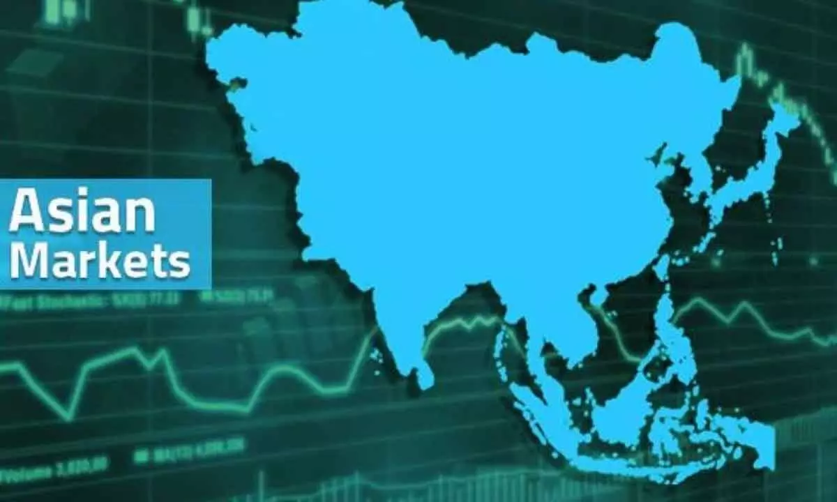 Asian stocks rise, US markets decline