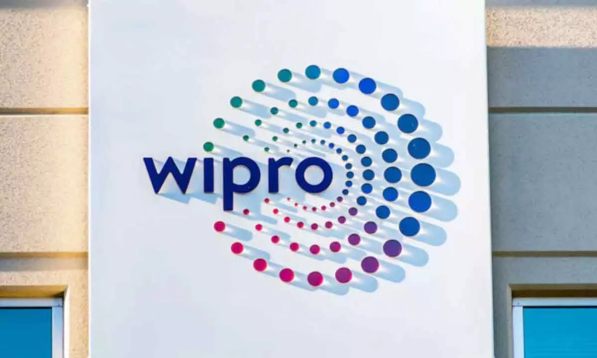 Wipro shares climb 2%