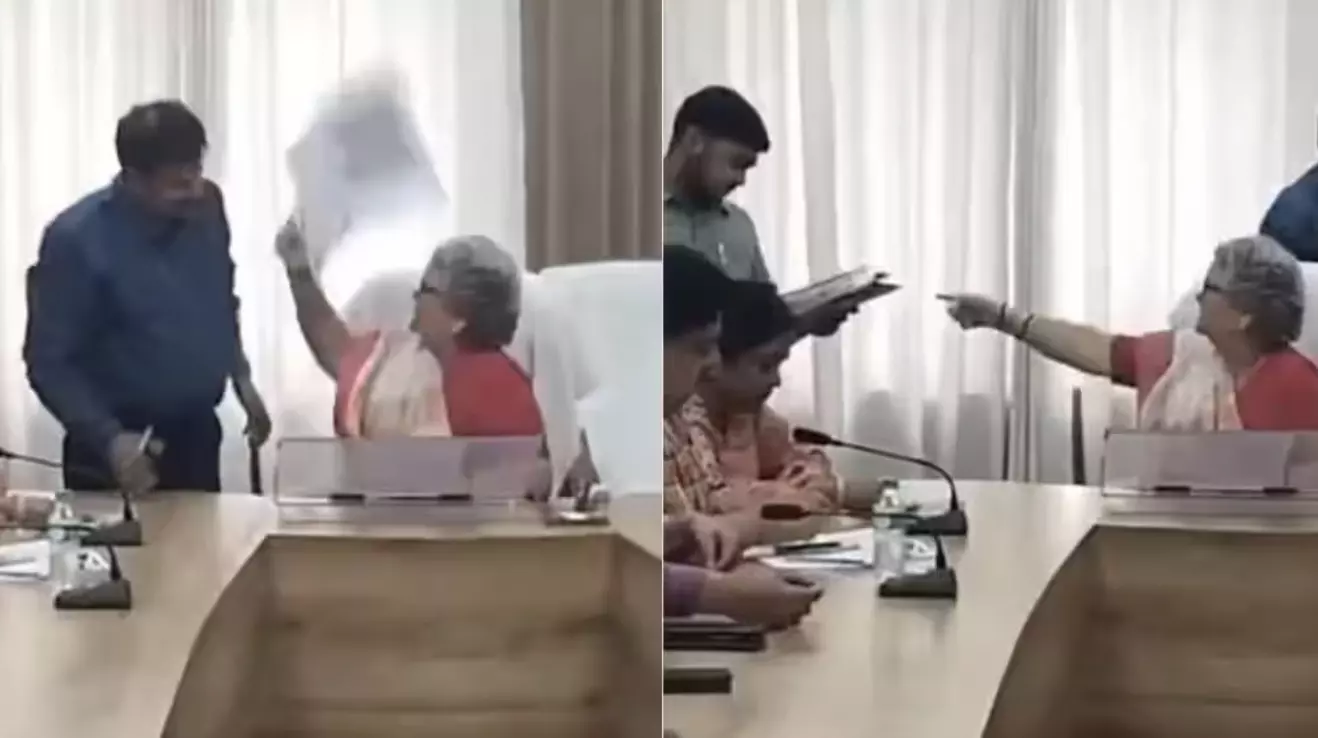 Kanpur Mayor loses cool, tosses file at government official over officials negligence in nullah cleaning: WATCH Kanpur Mayor loses cool, tosses file at government official over officials negligence in nullah cleaning: WATCH