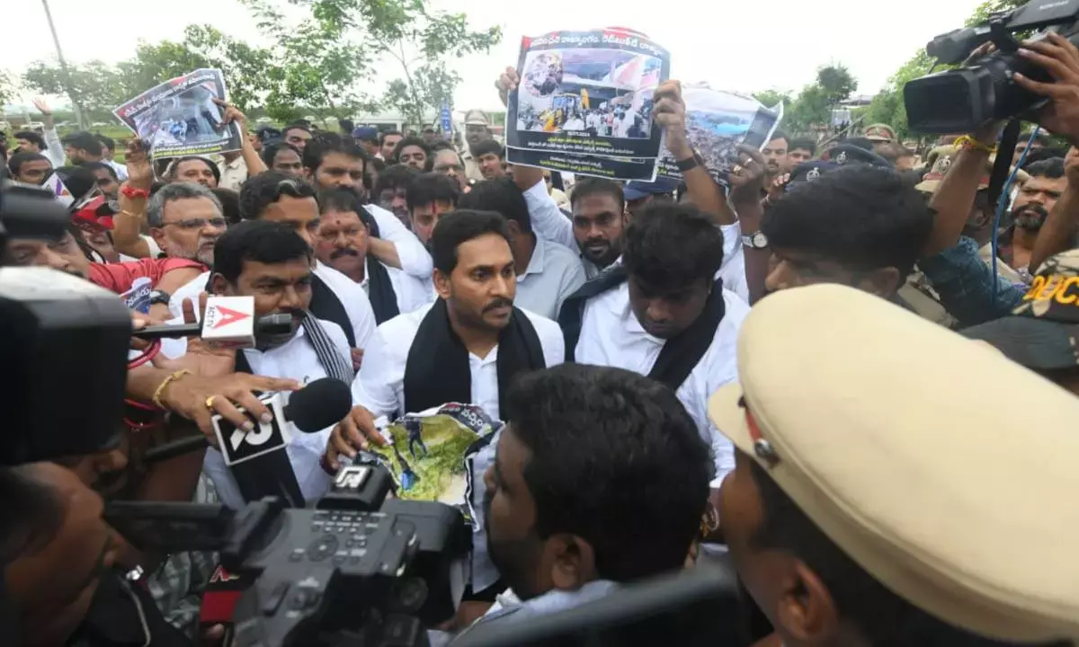 YSRCP president Y.S. Jagan Mohan Reddy protesting while entering Assembly premises in Amaravati near Vijayawada on Monday